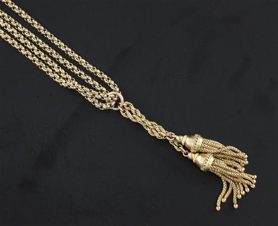 A pair of gold ropetwist and multi tassel drops suspended from a Victorian 9ct gold guard chain,